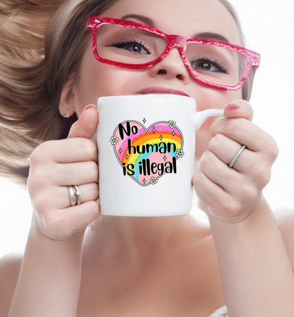 Anti Trump No Human is Illegal Mug